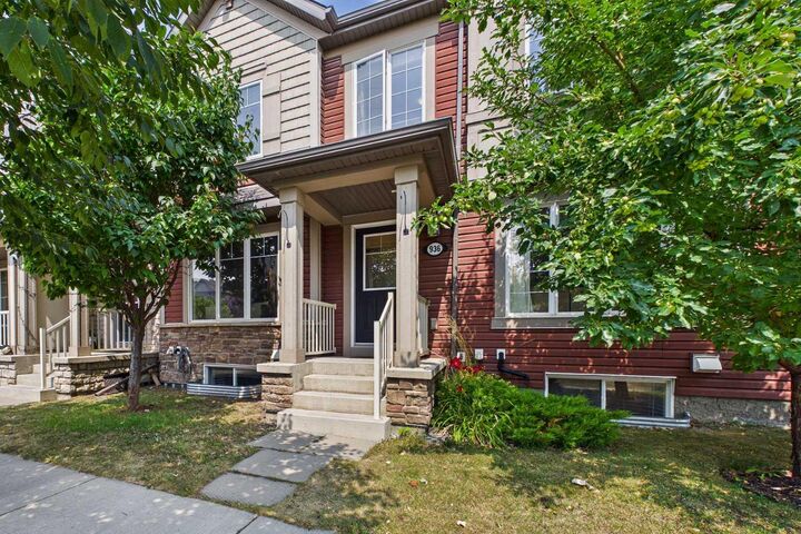 Property Photo: 936 Windsong Drive SW AB T4B 0P3