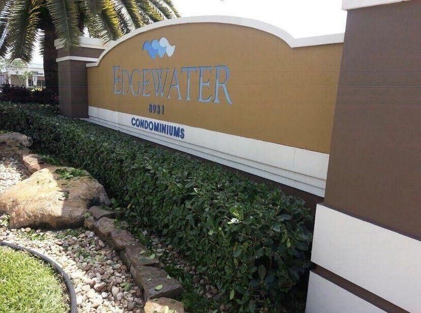 Property Photo:  8977 Wiles Road 203  FL 33067 