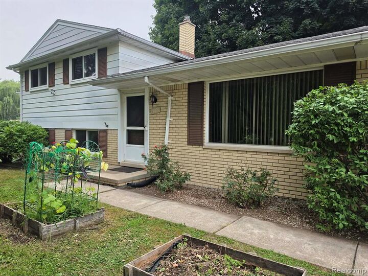Property Photo:  25590 Wick Road  MI 48180 
