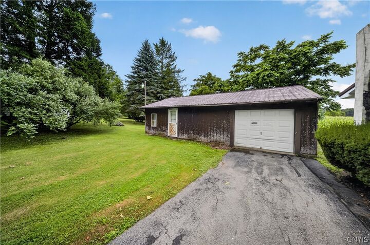 Property Photo: 1697 State Route 104A NY 13156