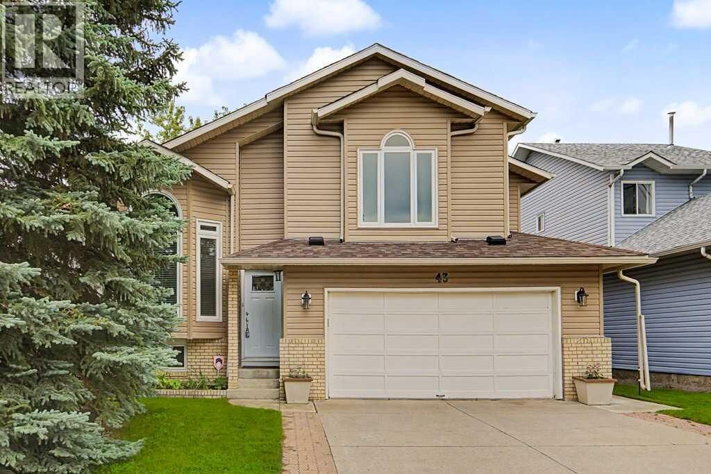 Property Photo:  43 Riverside Road Southeast  AB T2C 3T9 