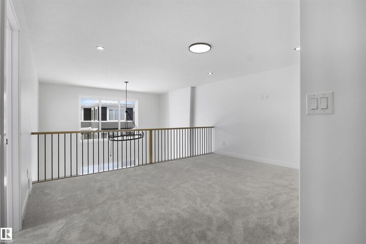 Property Photo: 3304 Chickadee Drive NW AB T5S 0V5