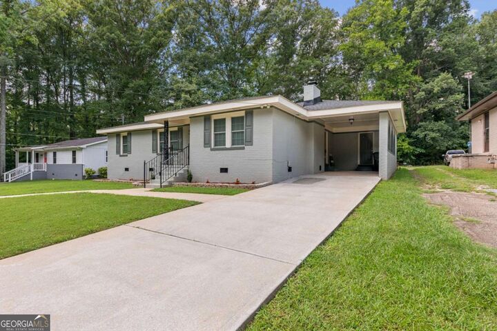 Property Photo:  10142 SW Puckett Street  GA 30014 