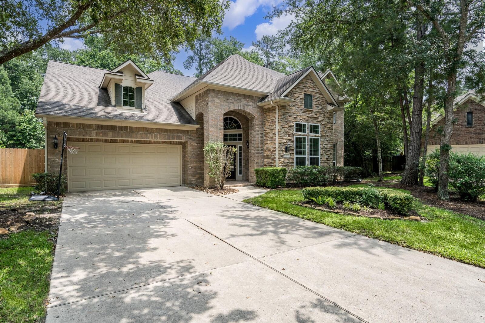 Property Photo: 11 Dahlia Trail Place TX 77382