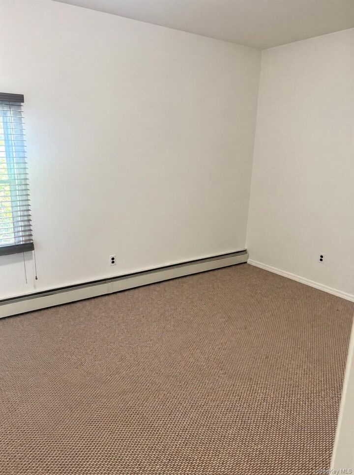 Property Photo:  48 Rosemont Avenue  NY 11738 