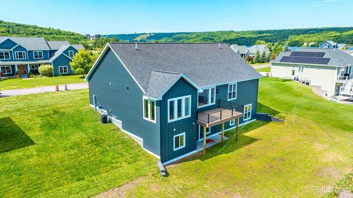 Property Photo:  7013 Sandpiper Drive  MI 49931 