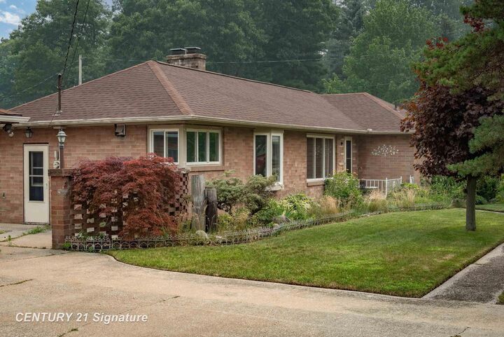 Property Photo:  103 Lincoln Drive  MI 48706 