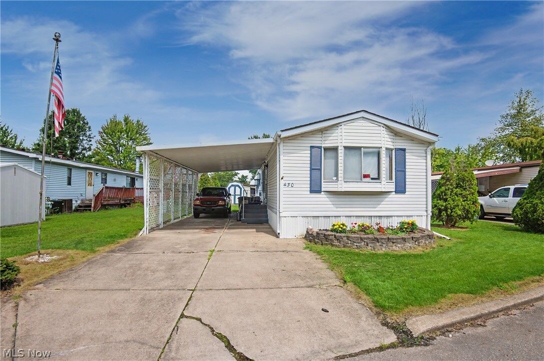 Property Photo: 430 Whispering Pines Drive SW OH 44481