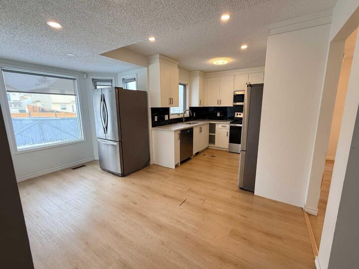 Property Photo: 651 Macewan Drive NW AB T3K 3R1