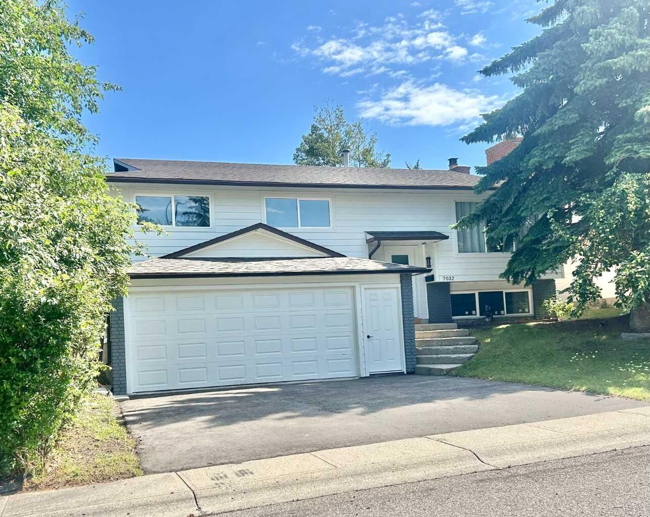 Property Photo: 7032 78 Street NW AB T3B 4H9