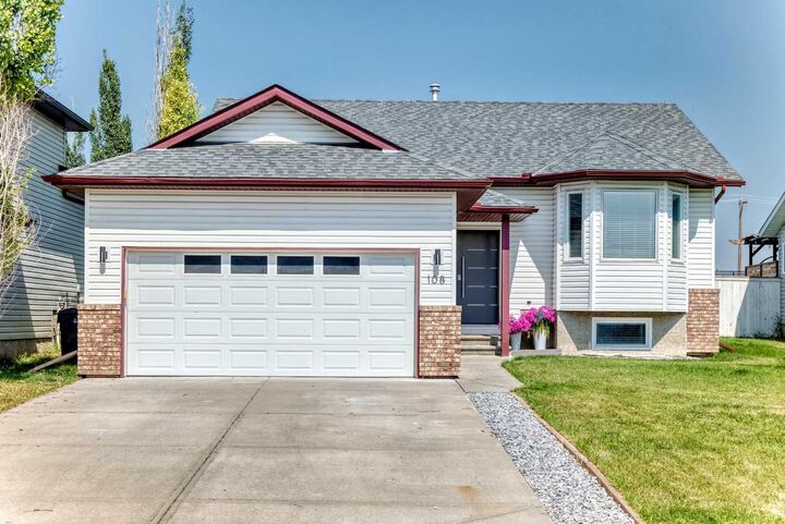 Property Photo: 108 High Ridge Place NW AB T1V 1X8
