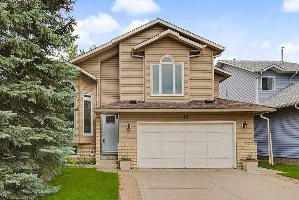 Property Photo:  43 Riverside Road SE  AB T2C 3T9 