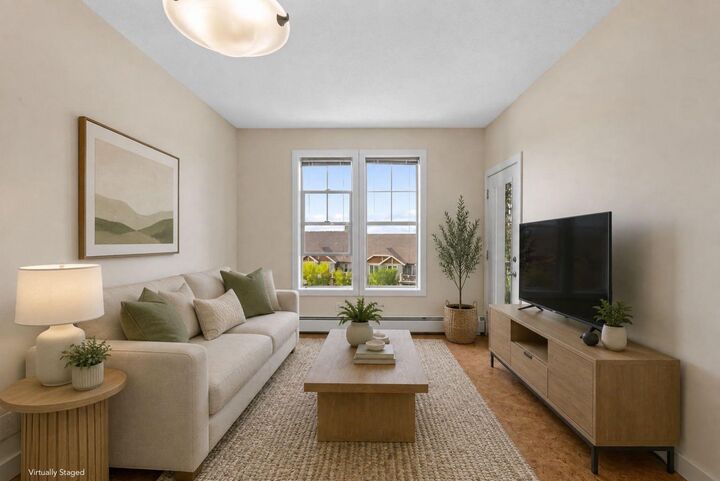Property Photo: 201 Sunset Drive 407 AB T4C 0H5