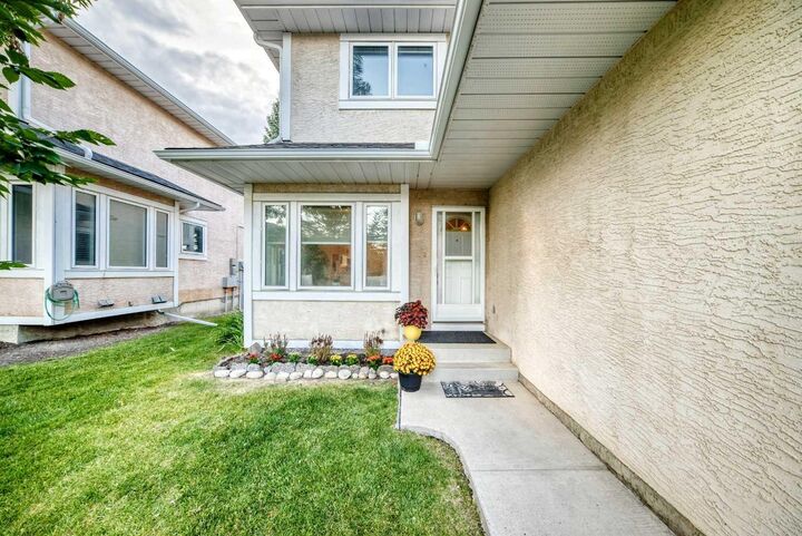 Property Photo:  388 Sandarac Drive NW 76  AB T3K 4E3 