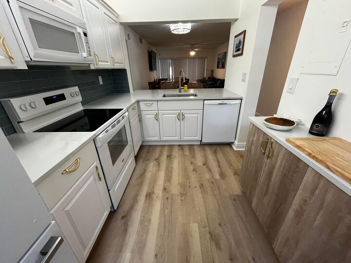 Property Photo:  12830 Briarlake Drive 103  FL 33418 