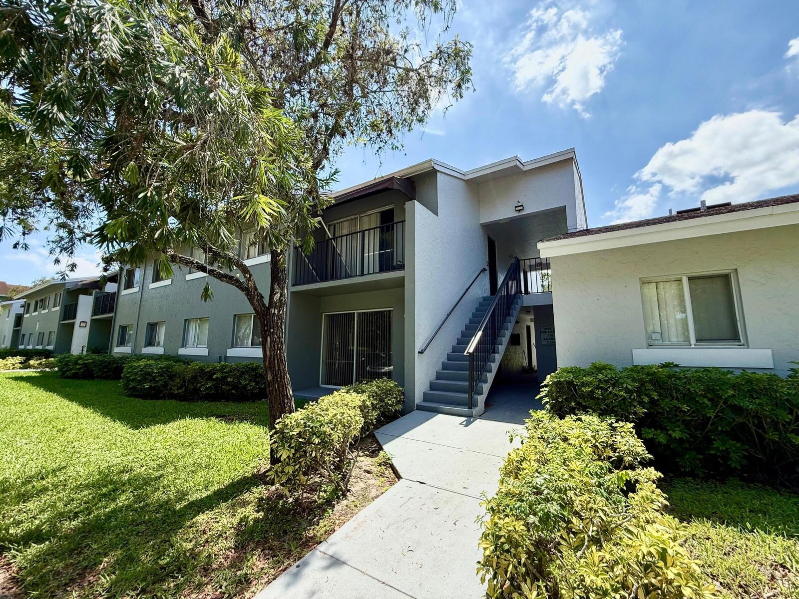 Property Photo:  1239 N Benoist Farms Road 110  FL 33411 