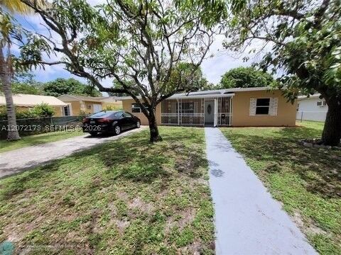 Property Photo:  1245 NW 126th St  FL 33167 