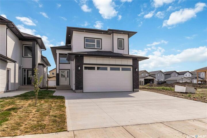 Property Photo: 1211 Nightingale Terrace SK S7L 7N5