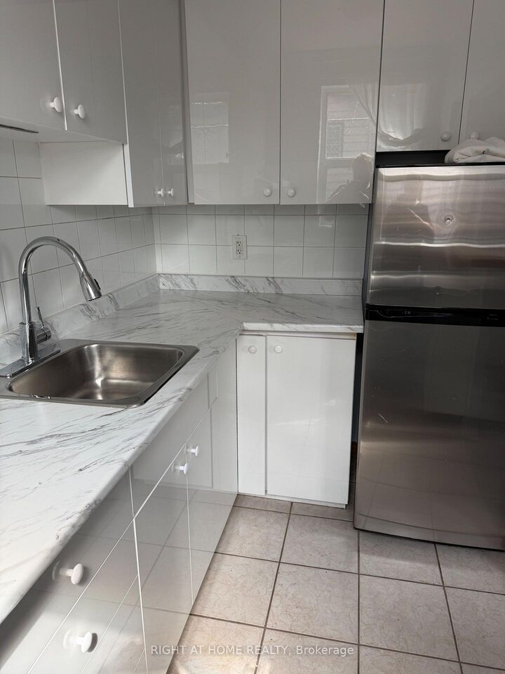 Property Photo: 115 Eighth Street 5 ON M8V 3C5