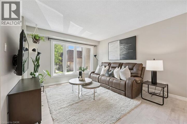 Property Photo: 49 Cedarwoods Crescent 53 ON N2C 2L1