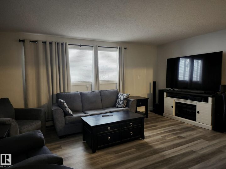 Property Photo: 6120 118 Avenue NW 4 AB T5W 1E8