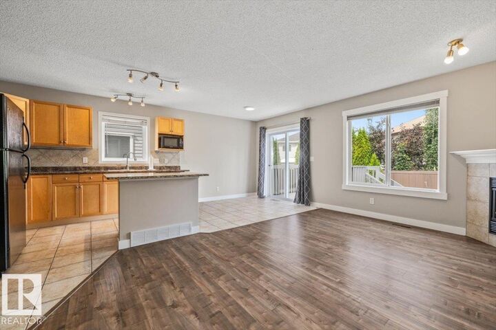 Property Photo:  1428 Hodgson Way NW 69  AB T6R 3P8 