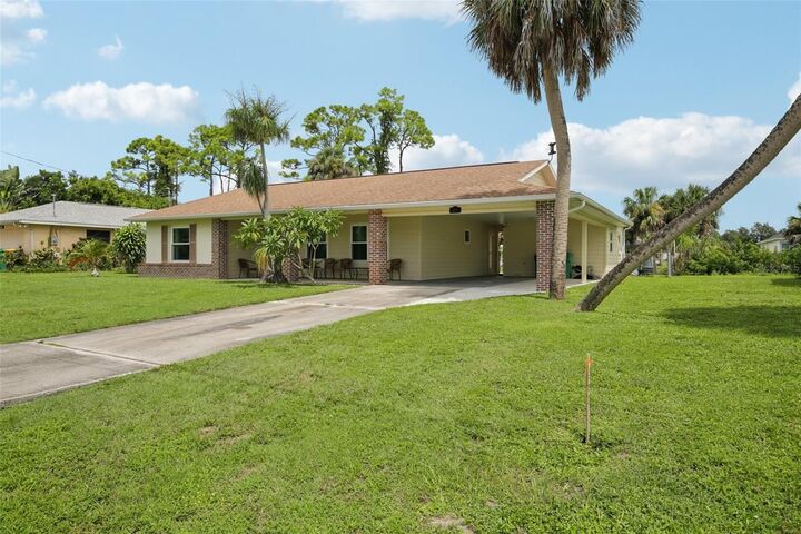 Property Photo: 2256 Auburn Boulevard FL 33948