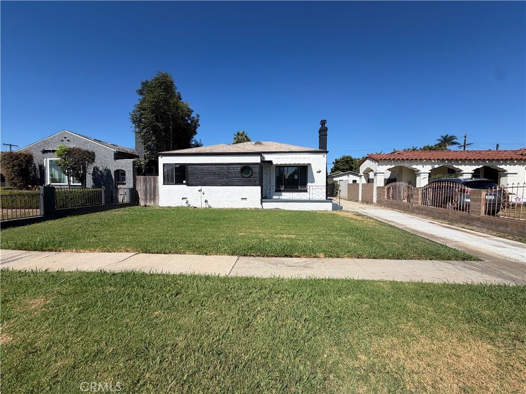 Property Photo:  9471 La Salle Avenue  CA 90047 