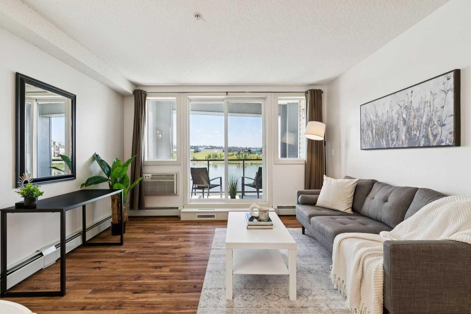 Property Photo:  108 Country Village Circle NE 210  AB T3K 0E3 