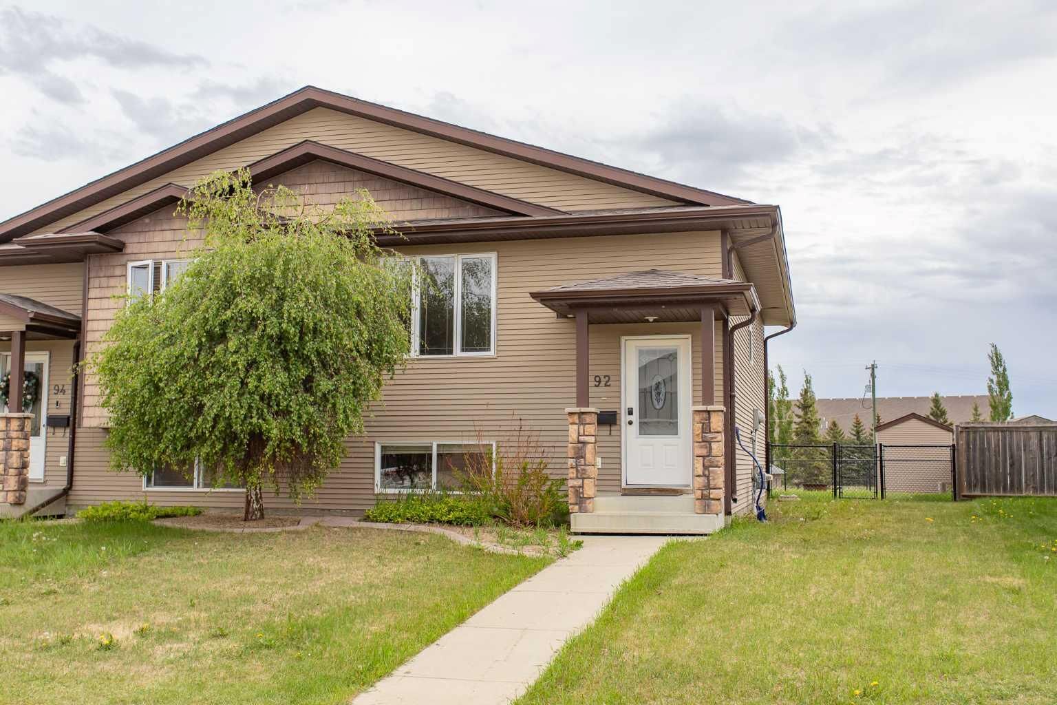 Property Photo: 92 Iron Wolf Boulevard AB T4L 0C7