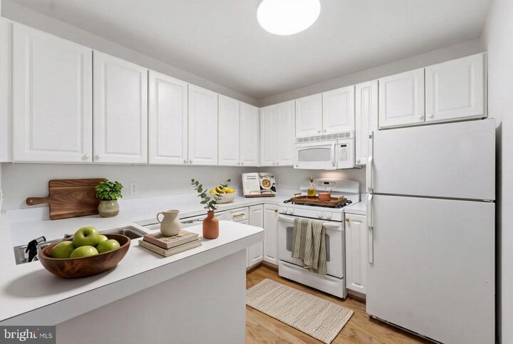 Property Photo: 7000 Falls Reach Drive 407 VA 22043