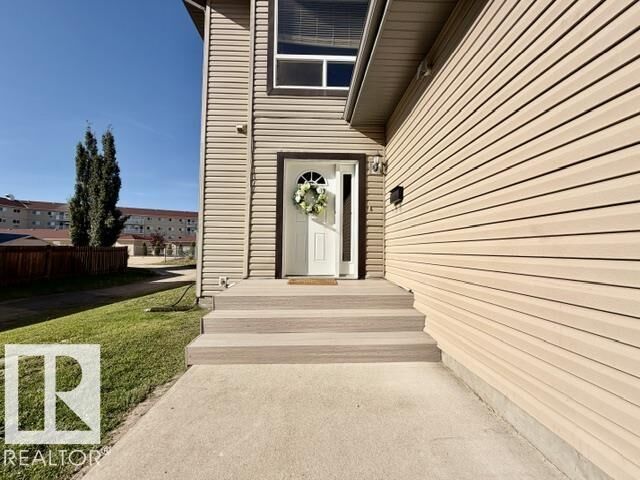 Property Photo:  4702 57 Avenue 8  AB T9A 3S9 