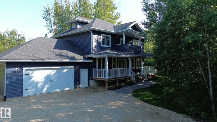 Property Photo: 267 Rge Road 20 AB T7Z 2V2