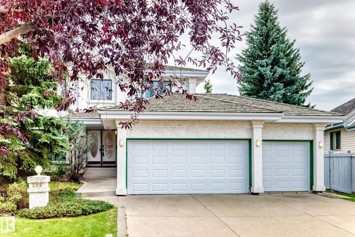 Property Photo:  209 Carmichael Close NW  AB T6R 2K6 
