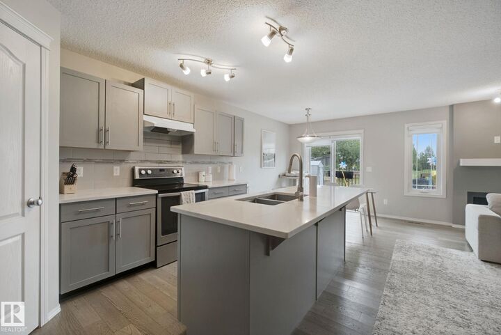 Property Photo: 735 176 Street SW AB T6W 2G8