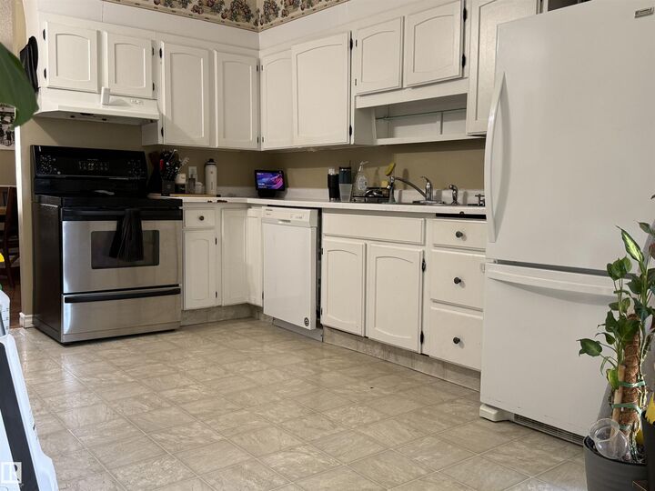 Property Photo: 153 Maple Crescent AB T9A 2E3