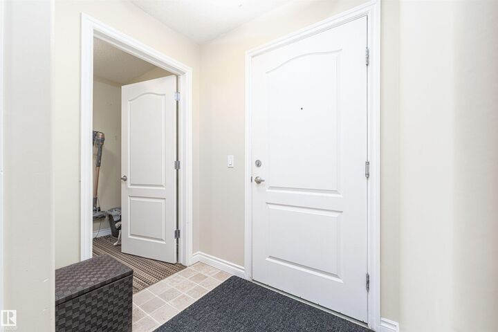 Property Photo:  9995 93 Avenue 211  AB T8L 1N5 