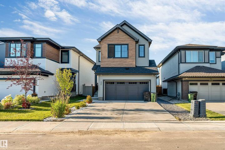 Property Photo: 3236 Chernowski Way SW AB T6W 5H2