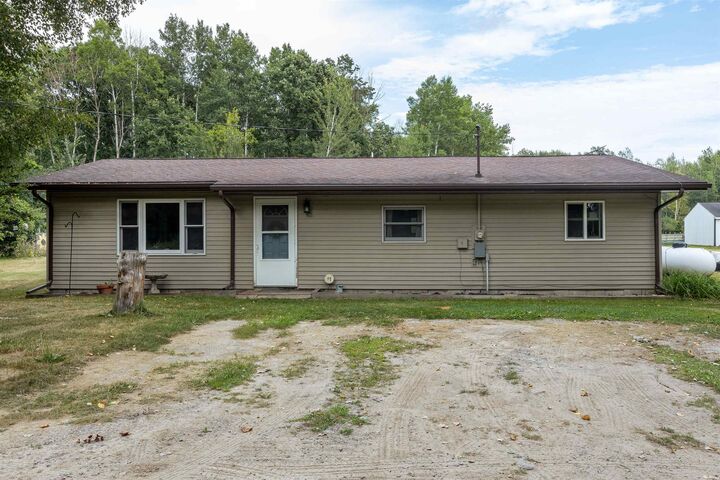 Property Photo:  1675 S 9 1/2 Mi  MI 48640 