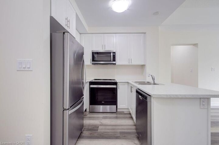 Property Photo: 450 Dundas Street E 110 ON L8B 0L7