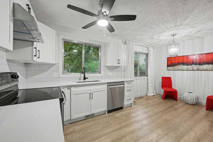 Property Photo: 711 118 Avenue SW AB T2W 0E6