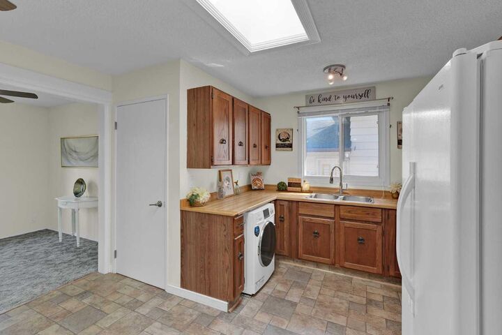 Property Photo: 27 Bedridge Way NE AB T3K 1M2