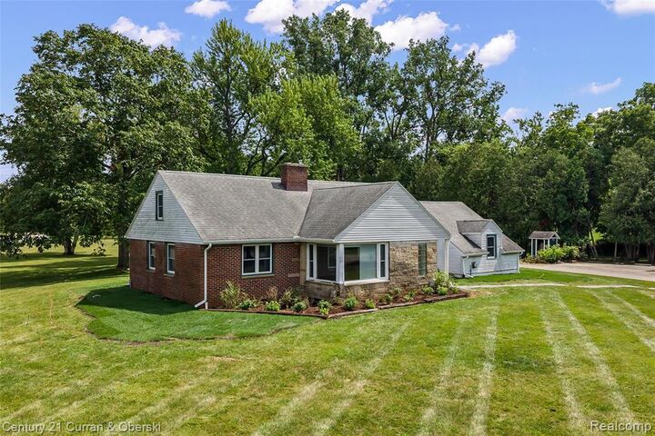 Property Photo:  901 City Road  MI 48158 