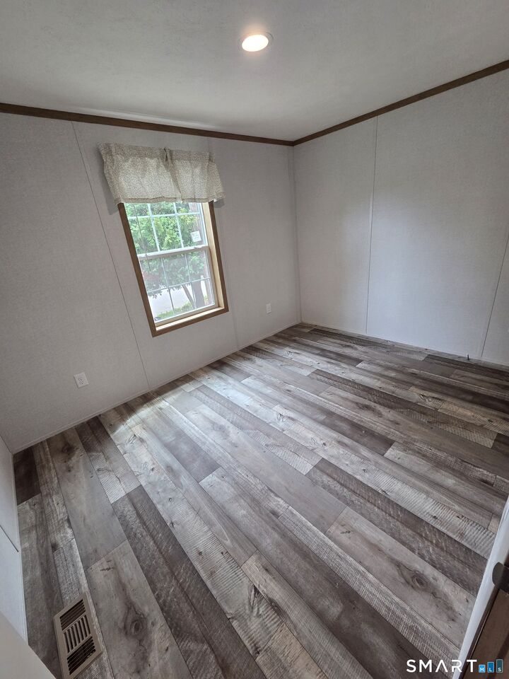 Property Photo:  303 Mohegan Park Road 11  CT 06360 