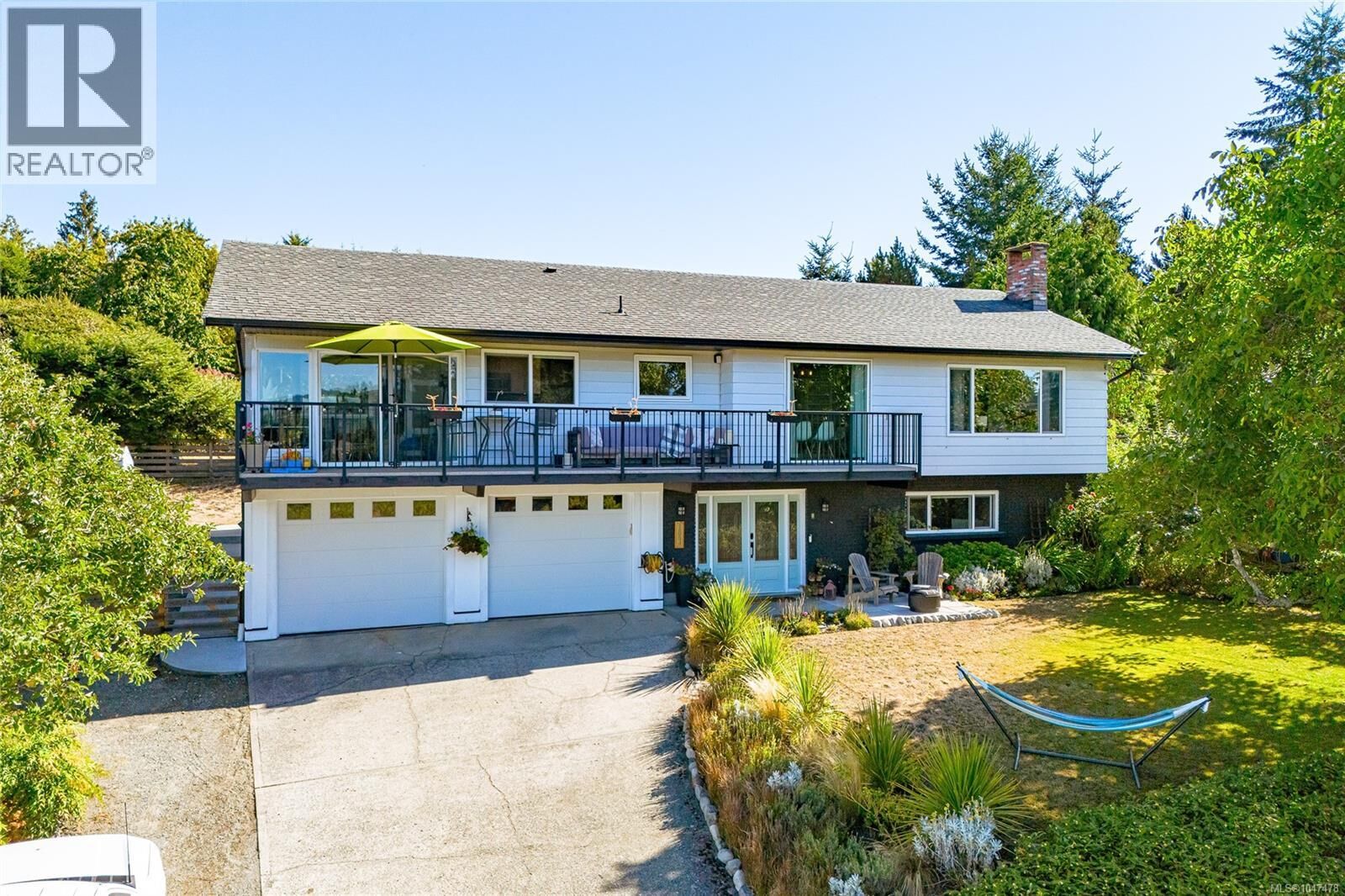Property Photo: 1854 Mt. Newton Cross Road BC V8M 1L1