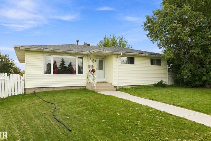 Property Photo: 13311 60 Street NW AB T5A 0S4