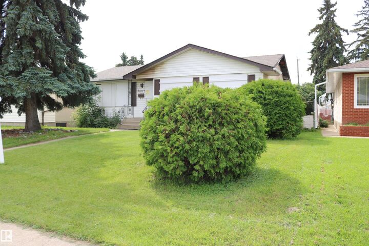 Property Photo:  13604 64 Street NW  AB T5A 0Y9 