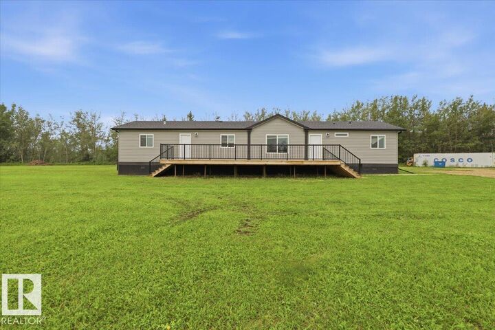Property Photo: 1409 Twp Rd 502 AB T0C 2P0