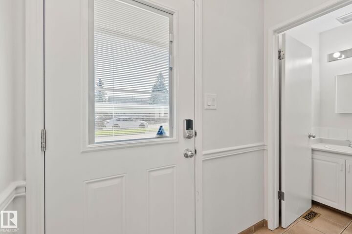 Property Photo:  18337 66 Avenue NW  AB T5T 1Z5 