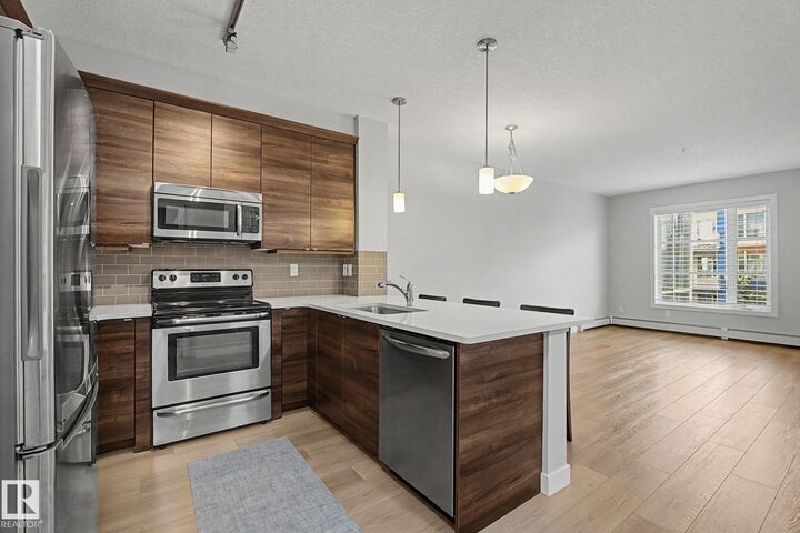 Property Photo: 2588 Anderson Way NW 301 AB T6W 0R2